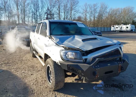 2009 Toyota Tacoma Base V6 z USA, uszkodzony, nr VIN 3TMLU42N59M021020